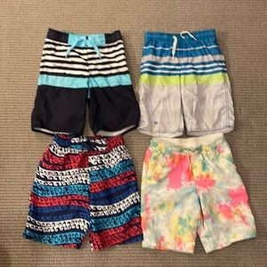 Four boys bathing suits